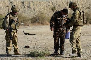 Civilian dead in Taliban suicide attack on NATO convoy in Kabul